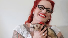 Bride holding ferret